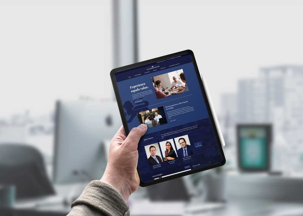man-holding-ipad