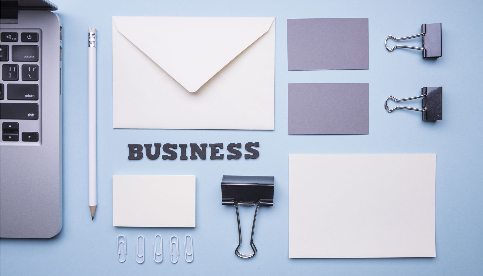 Branded business stationery laid out on a desk