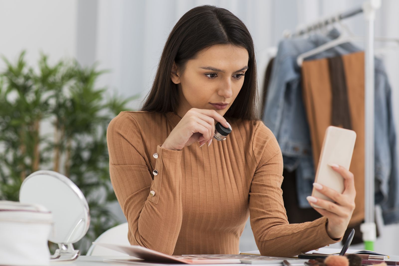 Woman checking a brand on her phone