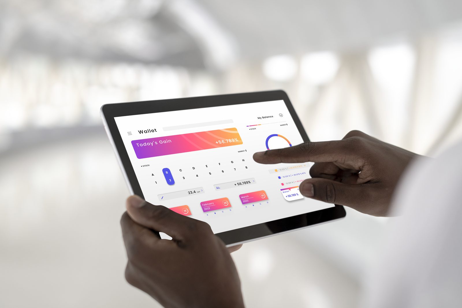 Man checking a performance dashboard on a tablet