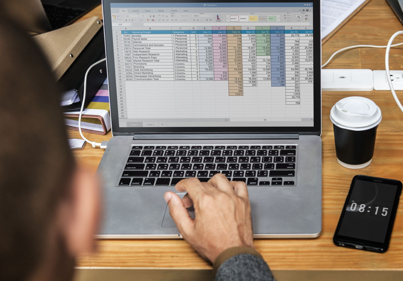 Spreadsheet of contacts open on a laptop