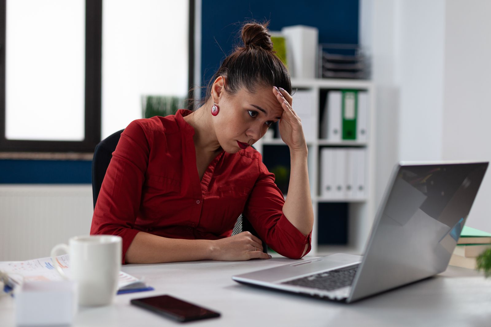 Business owner frustrated while working through a spreadsheet
